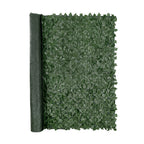 IvyShield artificial ivy privacy fence panel installed on backyard wooden fence